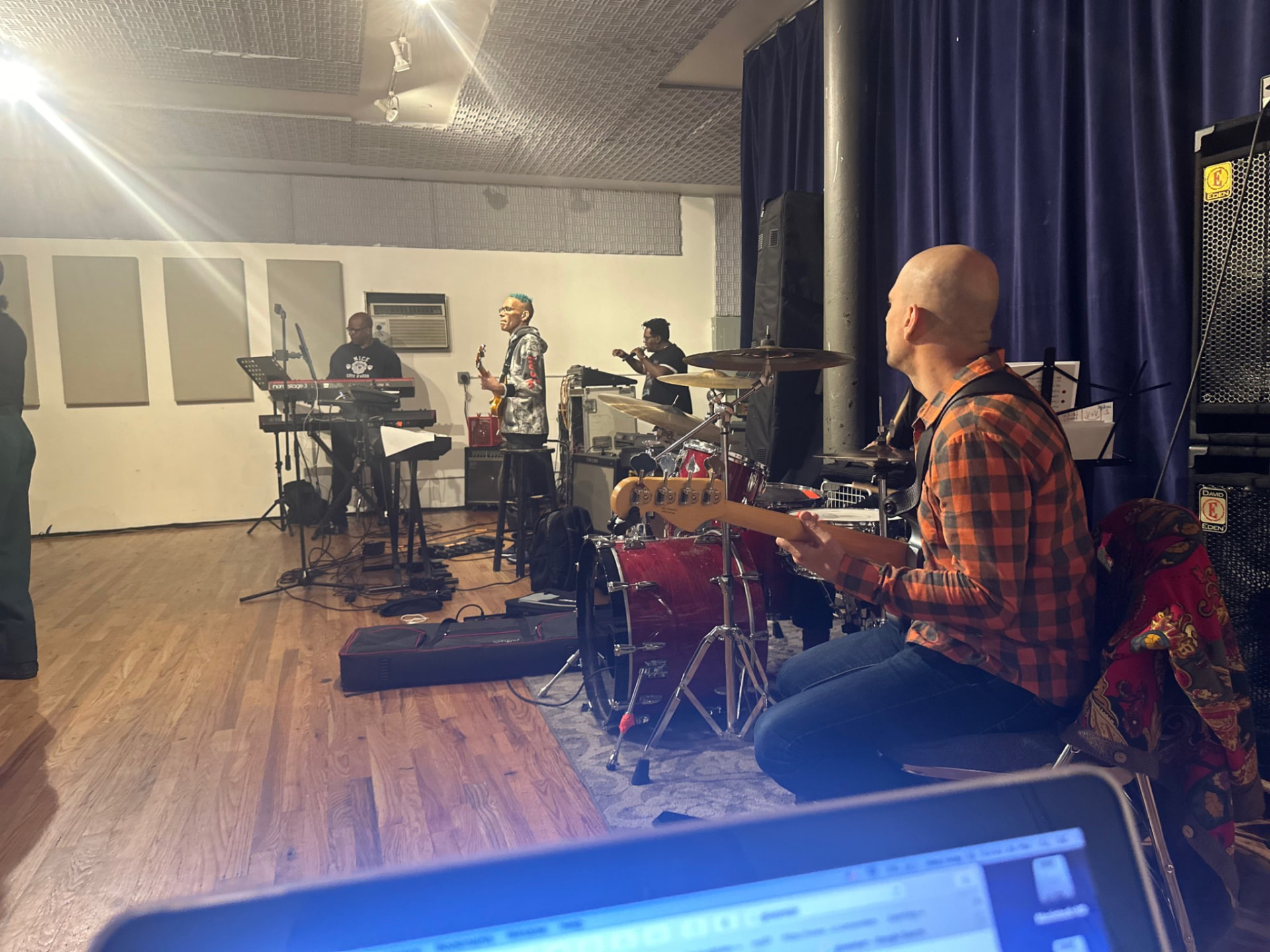 Gordon Dukes Music Company keyboard, bass, guitar and drums rehearsing together in a New York rehearsal room