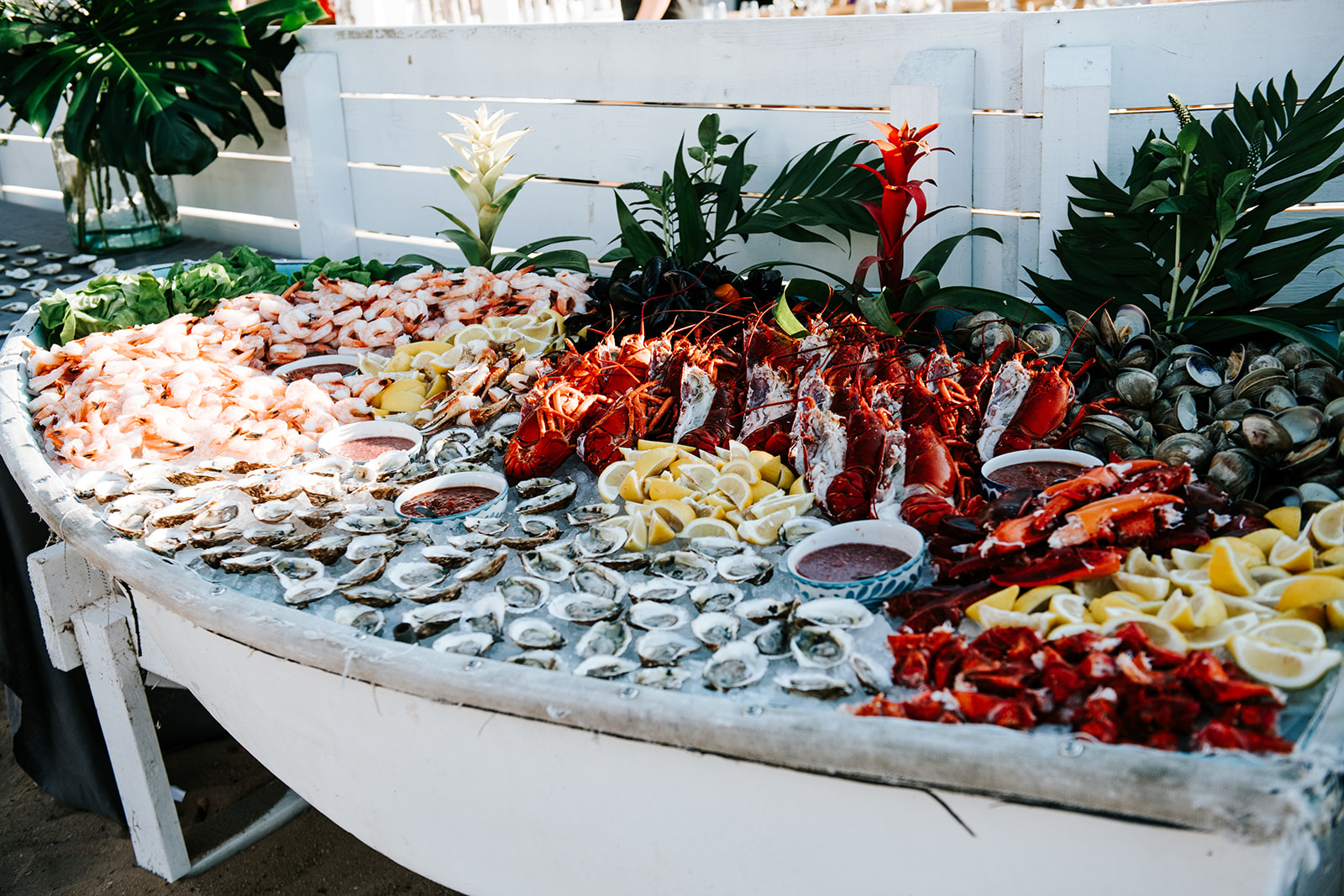 A boat of oysters, lobster and shrimp welcoming guests
