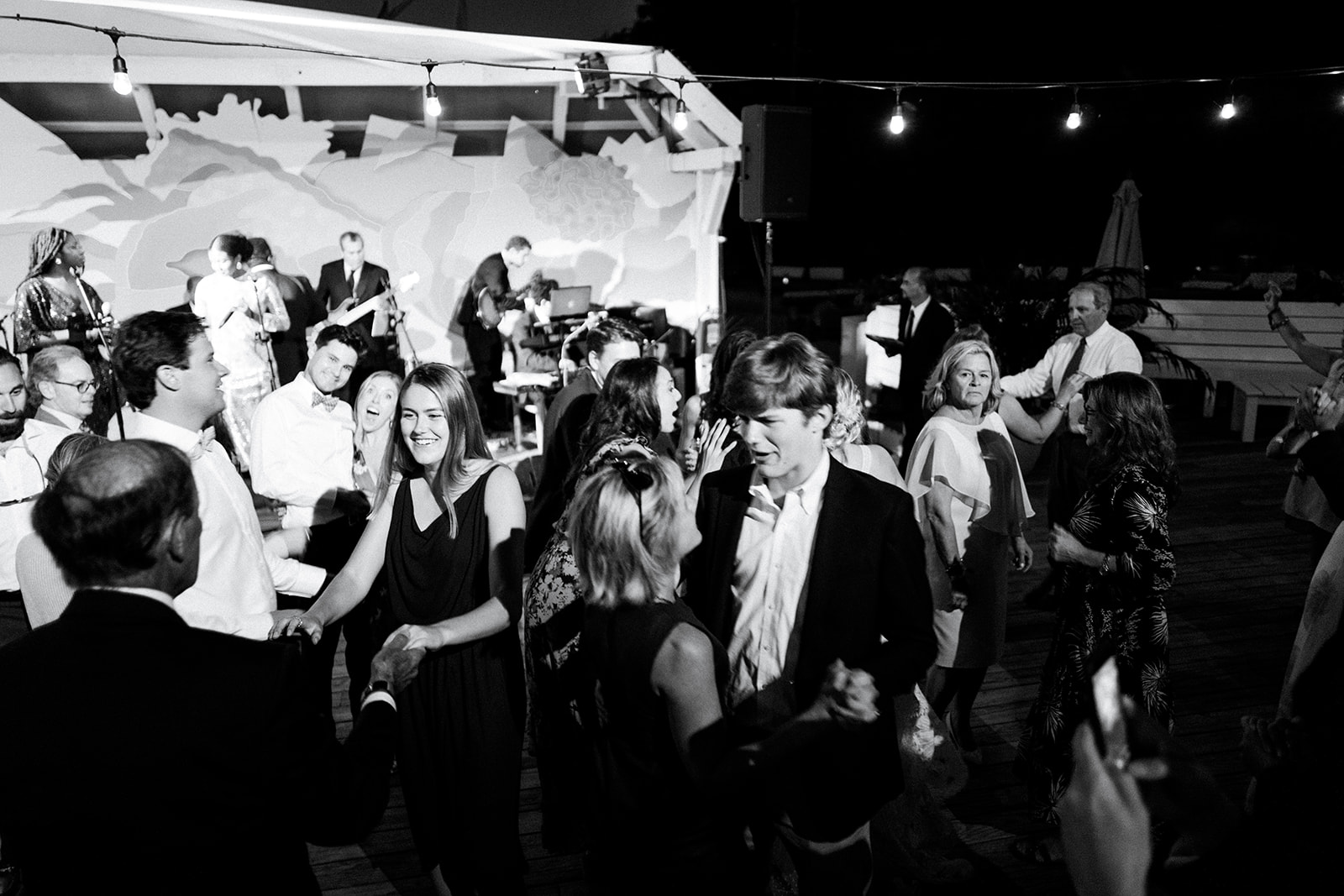 The dance floor in full motion, black and white