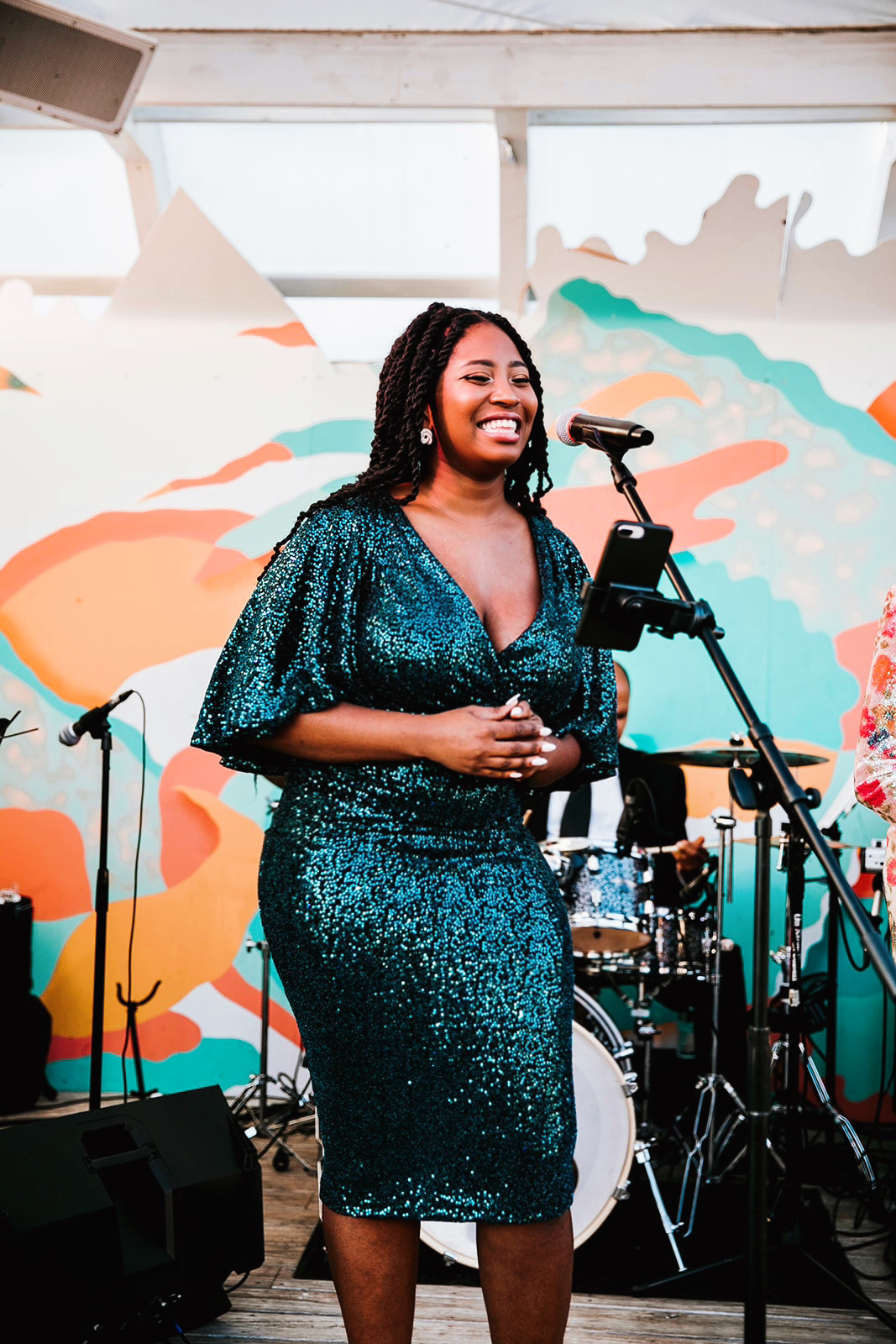 Portrait of a vocalist in a blue dress before the performance