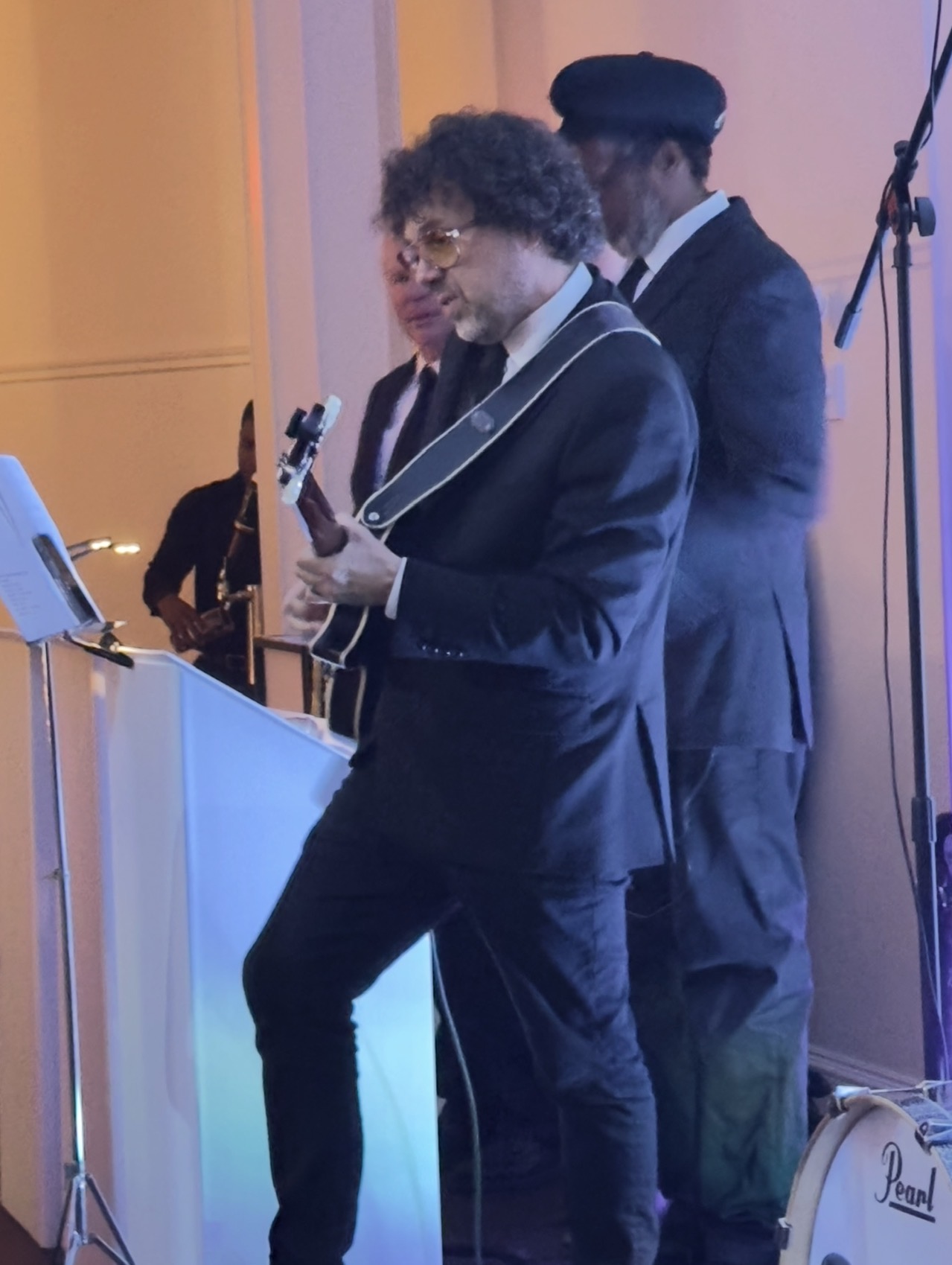 Close-up of the guitarist performing on stage