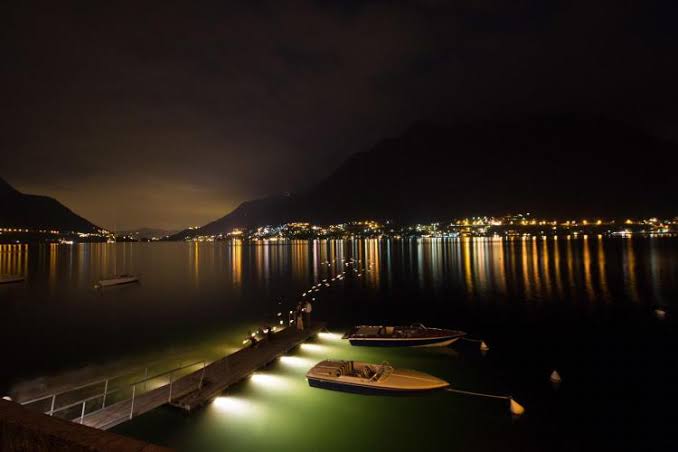 Evening lights along the lake before a proposal weekend on Lake Como