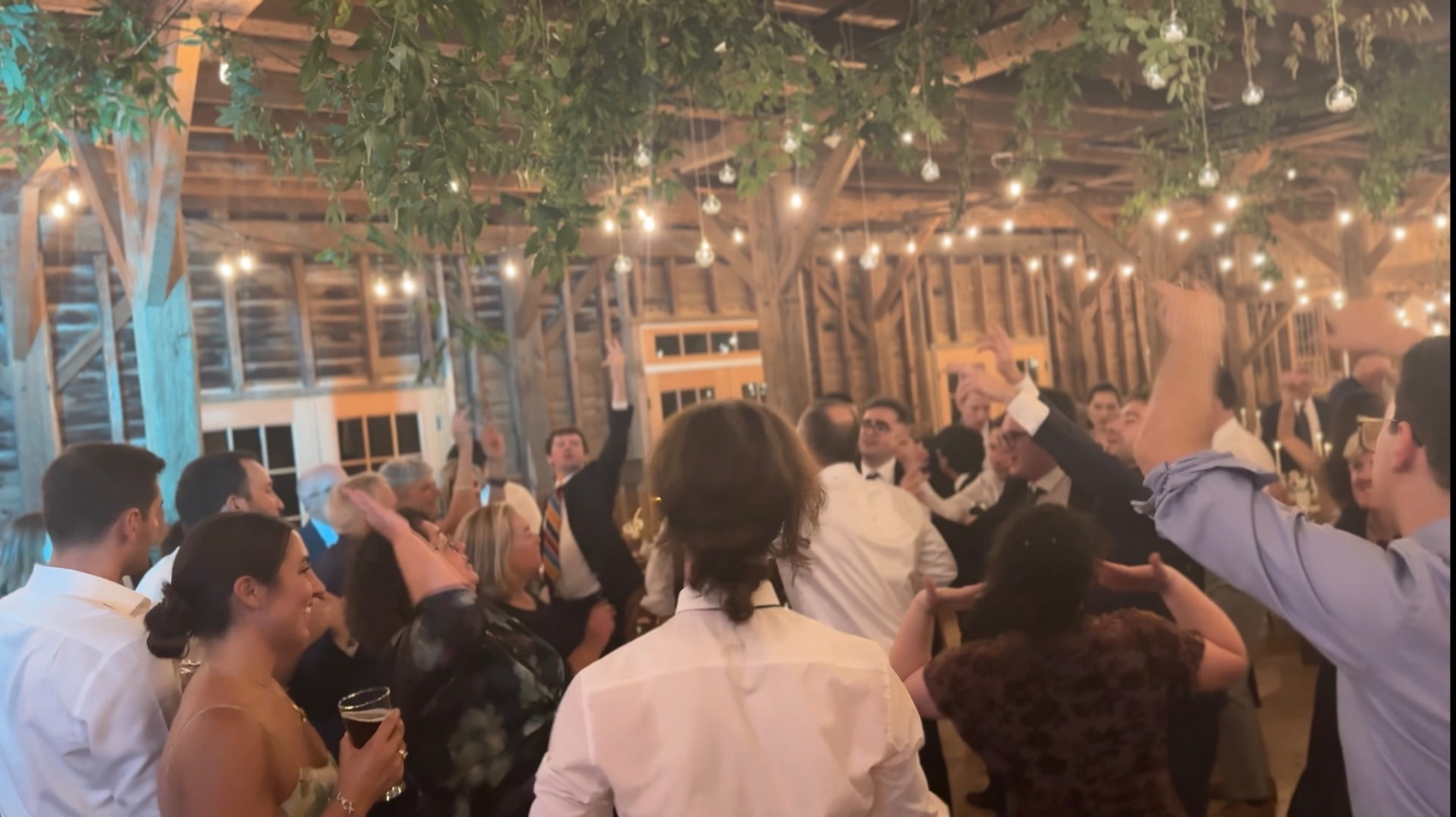 Guests filling the floor as the celebration reaches full voice